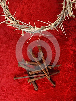 Crown of Thorns and Spikes on Red Background.