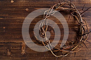 Crown of thorns on a wooden background - Easter