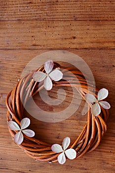 Crown from twigs with withered hydrangea flowers