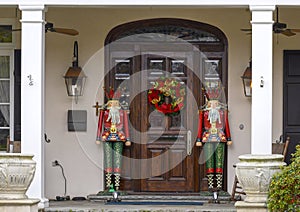 Crowned and bearded Nutcrackers standing guard protecting a house in Dallas, Texas