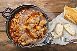 Crubeens with tomato sauce and bread