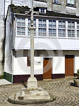 Cruceiro or chritian cross in A Fonsagrada village, Way to Santiago, Lugo province, Spain