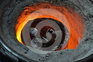 Crucible in furnace photo
