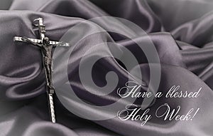 Crucifix Cross on black background with text for holy week