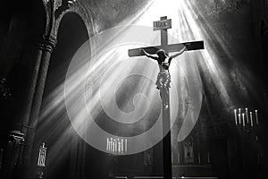 A crucifix illuminated by rays of light in a dark room, signifying divine presence photo