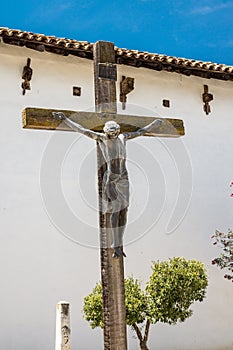 Crucifix at Mission San Miguel Arcangel photo