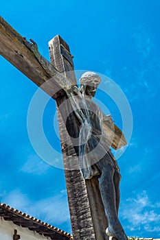 Crucifix at Mission San Miguel Arcangel photo
