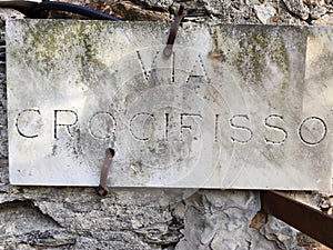 Crucifix street sign in Sant Ilario Genoa photo