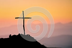 Crucifixion Of Jesus Christ - Cross At Sunset. The concept of the resurrection of Jesus in Christianity. Crucifixion on Calvary or