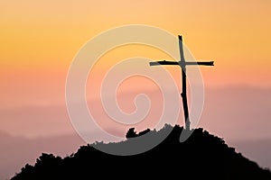 Crucifixion Of Jesus Christ - Cross At Sunset. The concept of the resurrection of Jesus in Christianity. Crucifixion on Calvary or