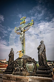 Crucifixion statue of Christ on Charles bridge, Prague, Czech Republic