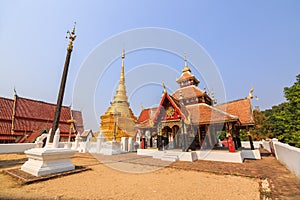 Cruciform shaped pavilion and golden Buddhist pagoda