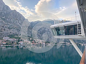 From a cruise balcony looking at Montenegro Village and cruise ship bridge