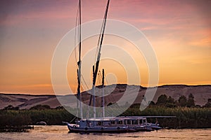Cruise boat on the Nile river at sunset, Egypt