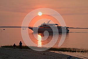 Cruise boat at sunset