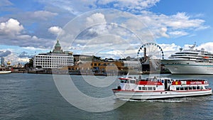 Cruise boats, Sky Wheel Uspenski Eastern Orthodox Cathedral on the background at Harbour