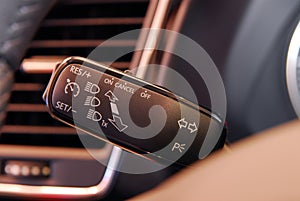 Cruise control button, and car lighting switch