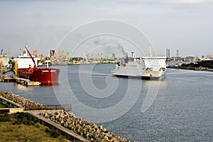 Cruise ferry leaving to the open sea on summer eve