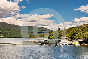 Cruise moved by the energy of the wind and the sun in the Sanabria lake in Zamora Spain photo