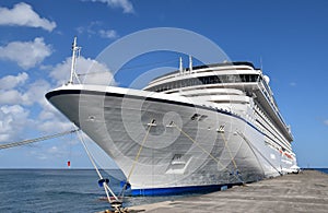 Cruise passenger ship docked at pier