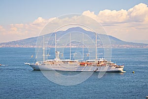 Cruise Sailship on anchor with mount Vesuvius on the backround