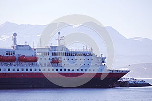 Cruise service vessel Hurtigruten under the Finnsnes bridge, Troms