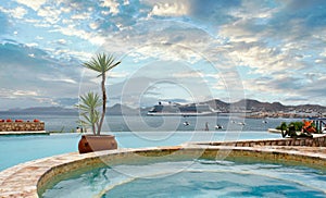 Cruise Ship Anchored Beyond Tropical Pool