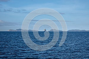 A cruise ship approaches the port of Vigo