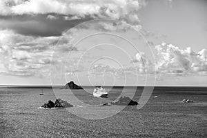 Cruise ship in blue sea on cloudy sky in gustavia, st.barts. Travel by water, discovery and adventure. Vessel and marine