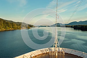 Cruise ship bow, southbound on ocean channel, Alaska Inside Passage, afternoon.