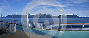 Cruise ship deck and mountain panorama