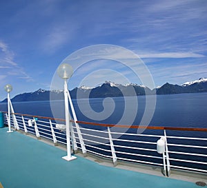 Cruise ship deck and mountain panorama