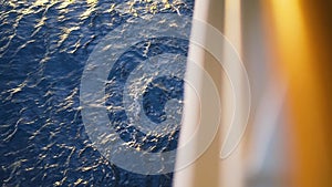 Cruise Ship Deck Railing View. Stock. View of the sea waves from the ship