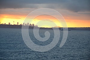 Cruise ship departing Sydney at dusk