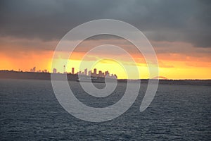 Cruise ship departing Sydney at dusk