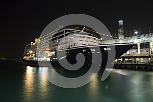 Cruise ship docked at ocean terminal at night