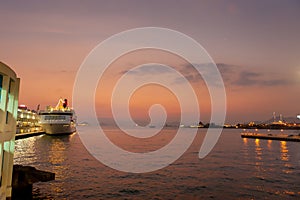 Cruise ship docking at Star Ferry Pier in Victoria Harbour, Hong Kong, China