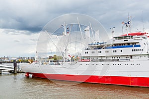 Cruise ship at the Elbe river, port of Hamburg, Germany