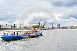 Cruise ship at the Elbe river, port of Hamburg, Germany