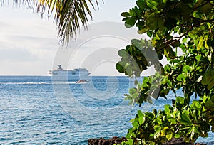 Cruise ship far at the horizon on the Caribbean sea,