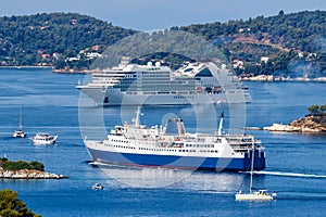 Cruise ship, ferry and boats in the Mediterranean Sea Aegean island of Skiathos, Greece