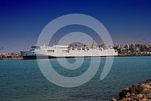 The cruise ship flows out of the port, a tourist cruise
