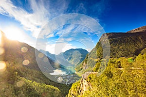 Cruise ship on Geiranger fjord at sunset Norway