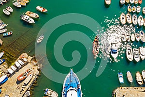 Cruise ship at harbor. Aerial view of beautiful yacht and boats in marina bay