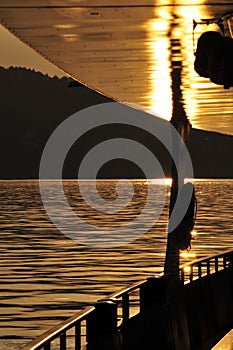 Cruise ship on lake at sunset