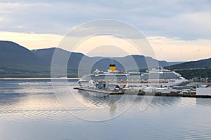 A cruise ship is moored in the harbor. View of a large ship.