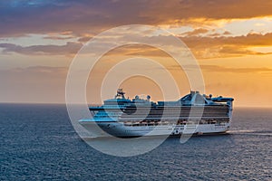 Cruise Ship on the Ocean at Sunset