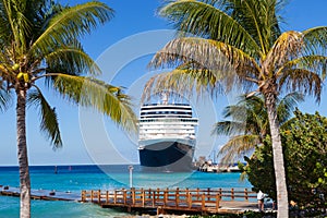 Cruise ship and palm trees at Grand Turk, Turks and Caicos Islands in the Caribbean