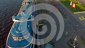 Cruise ship at the pier at sunset. Tourism. Aerial footage