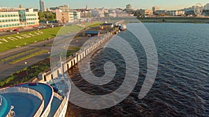 Cruise ship at the pier at sunset. Tourism. Aerial footage